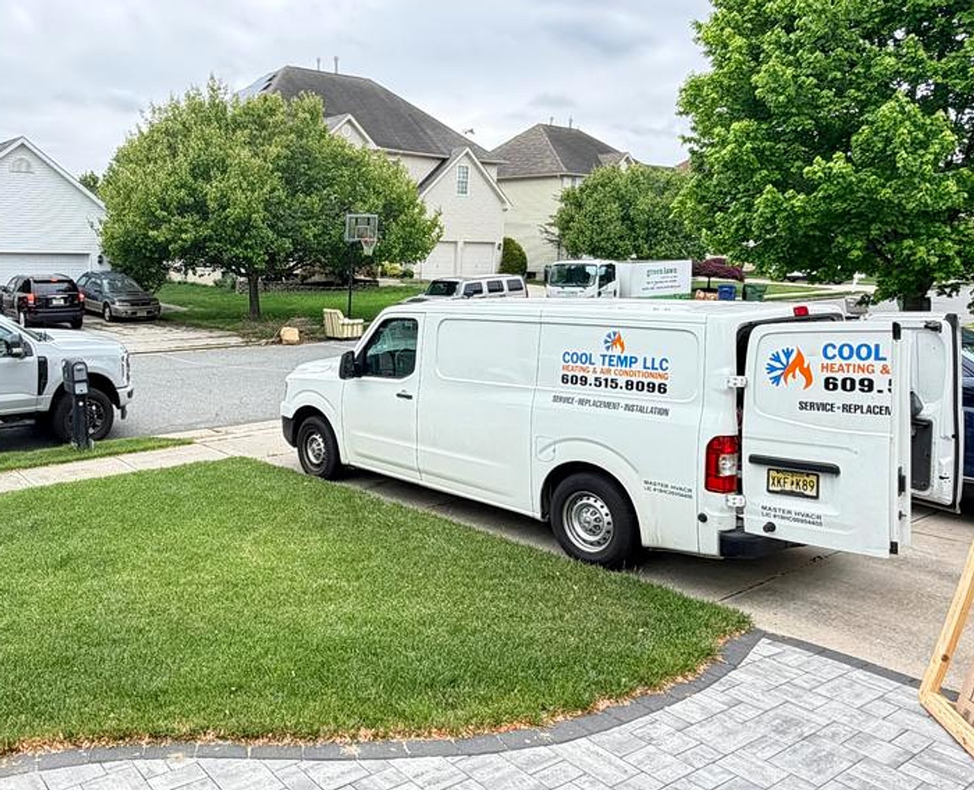 Cool Temp service van at a residential property